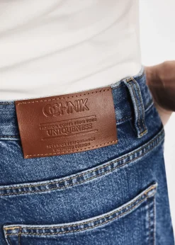 Granatowe spodnie jeansowe damskie